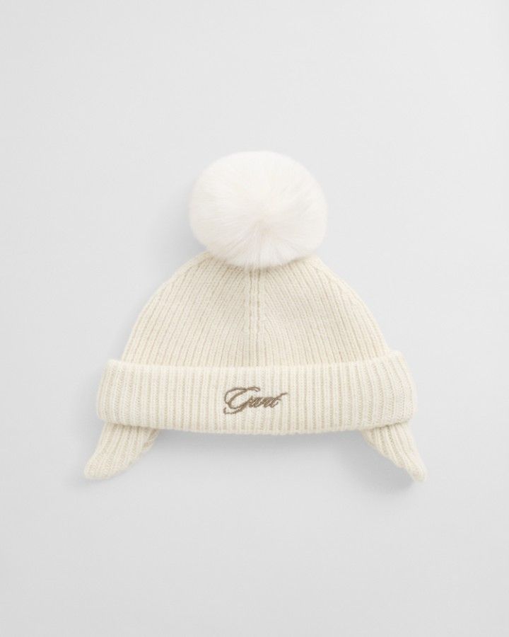 EAR FLAPS POM POM BEANIE